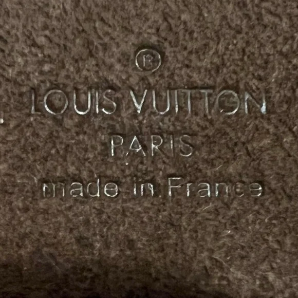 LOUIS VUITTON MONOGRAM GLASE FORCE WRAP LEATHER BRACELET.